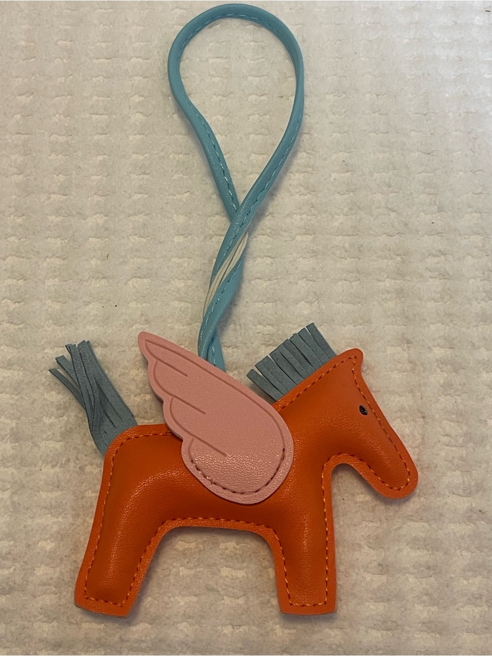 Orange Unicorn Bag Ornament with Glitter Wing